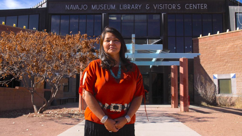 Jennifer in front of the Navajo Museum, Library, & Visitors Center from Looking for Leia