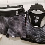 a Black Widow sports bra and shorts Black Widow Activewear by Her Universe