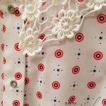 The collar of the white tie-front tank Her Universe Captain America Shirt Detail