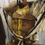 A Mad Max-style costume partially made out of an actual VW Beetle