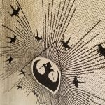 cool graphic on the cold-shoulder sweater