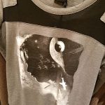 The t-shirt's mesh paneling and beautiful graphic