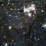 The pattern on the mockneck dress along with its hidden zipper detail