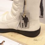 Finn's boots also zip up.